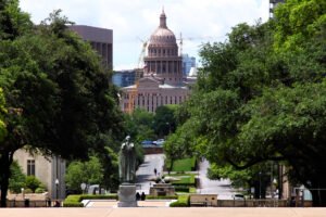 Texas Capitol dome seen from the University of Texas South Mall.