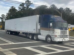 A semi-trailer truck of the type that runs on diesel fuel, photographed in Florida.